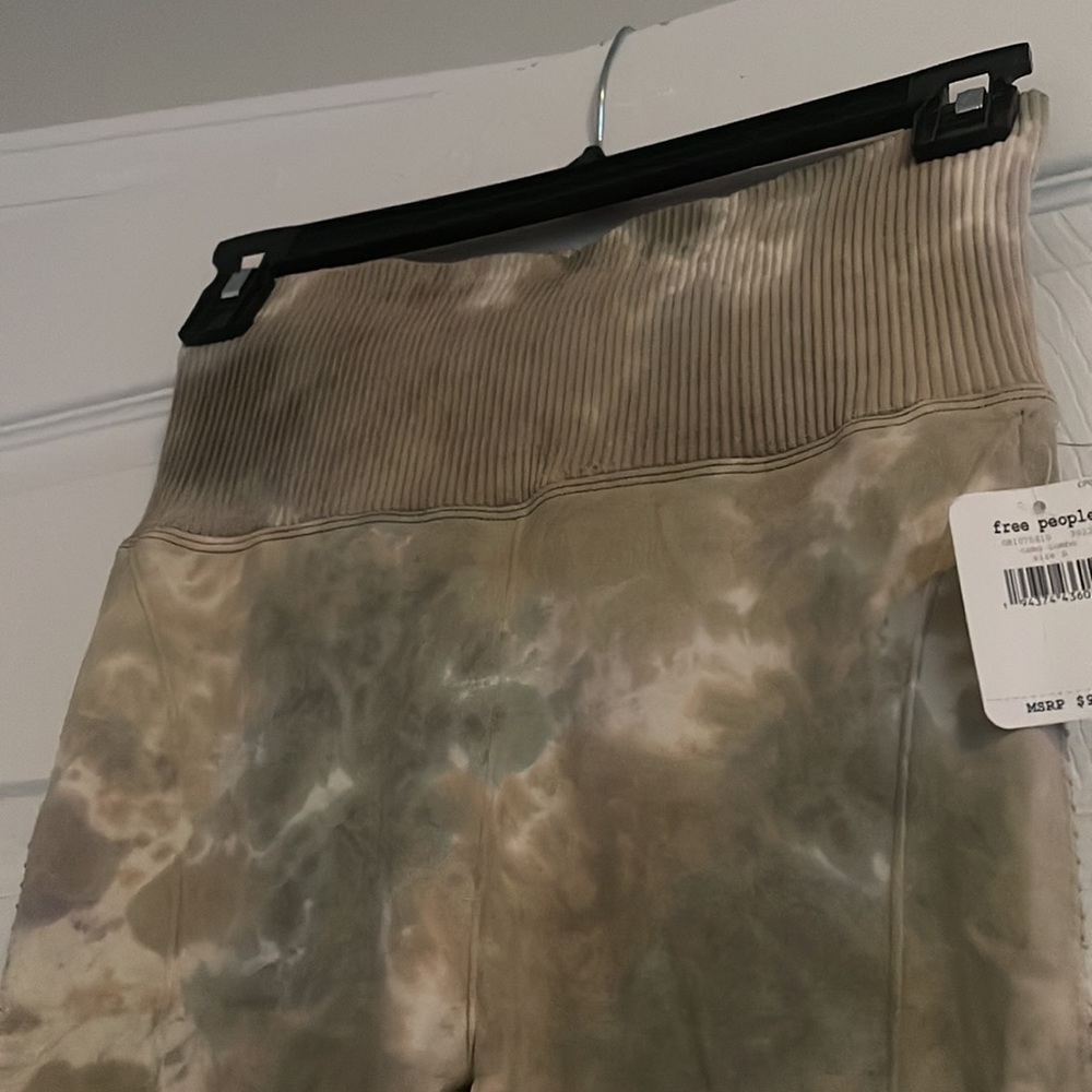 Beautiful Free People legging in tan,white and gray colors with great waistband.